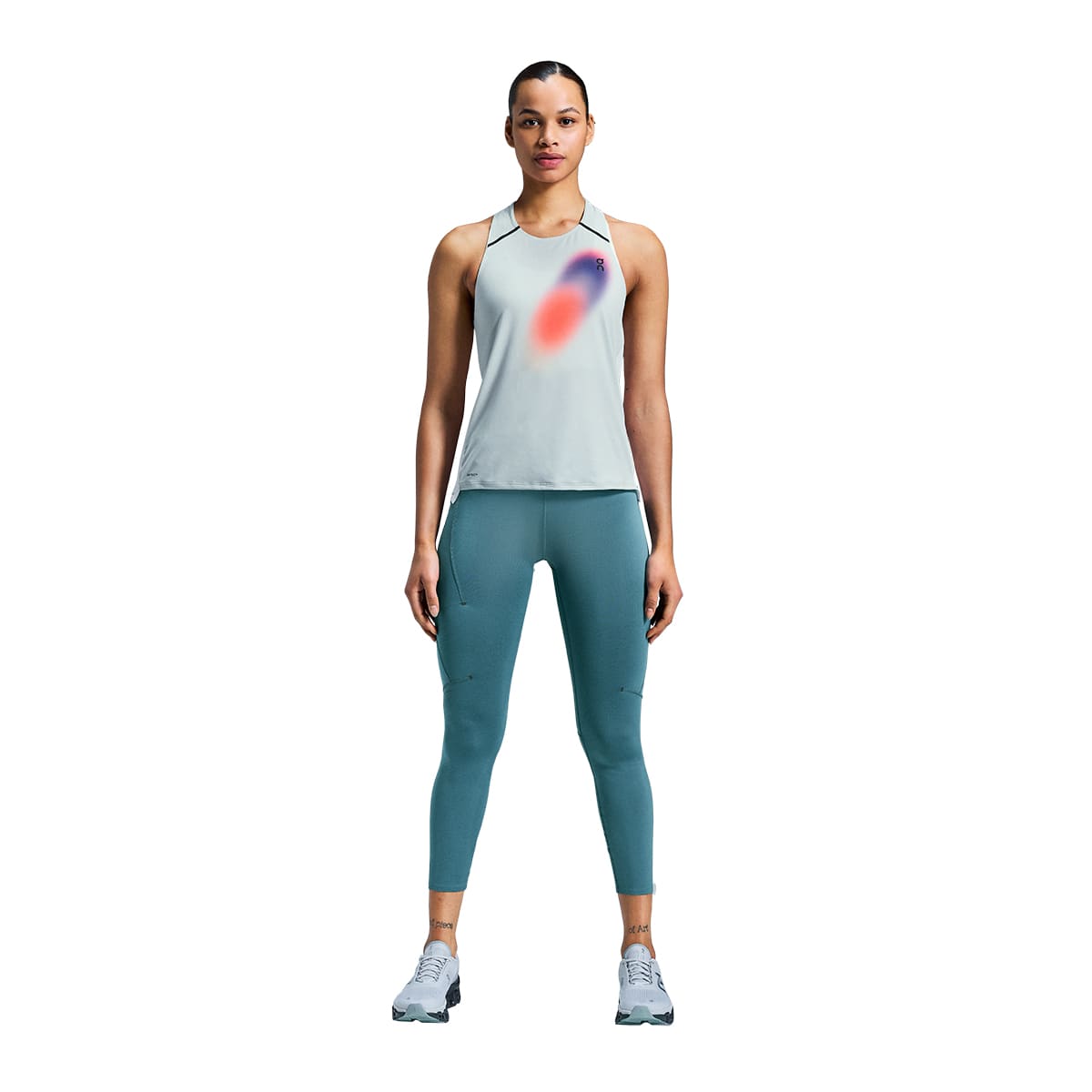Woman wearing the On Performance Tights 7-8 Colour Storm