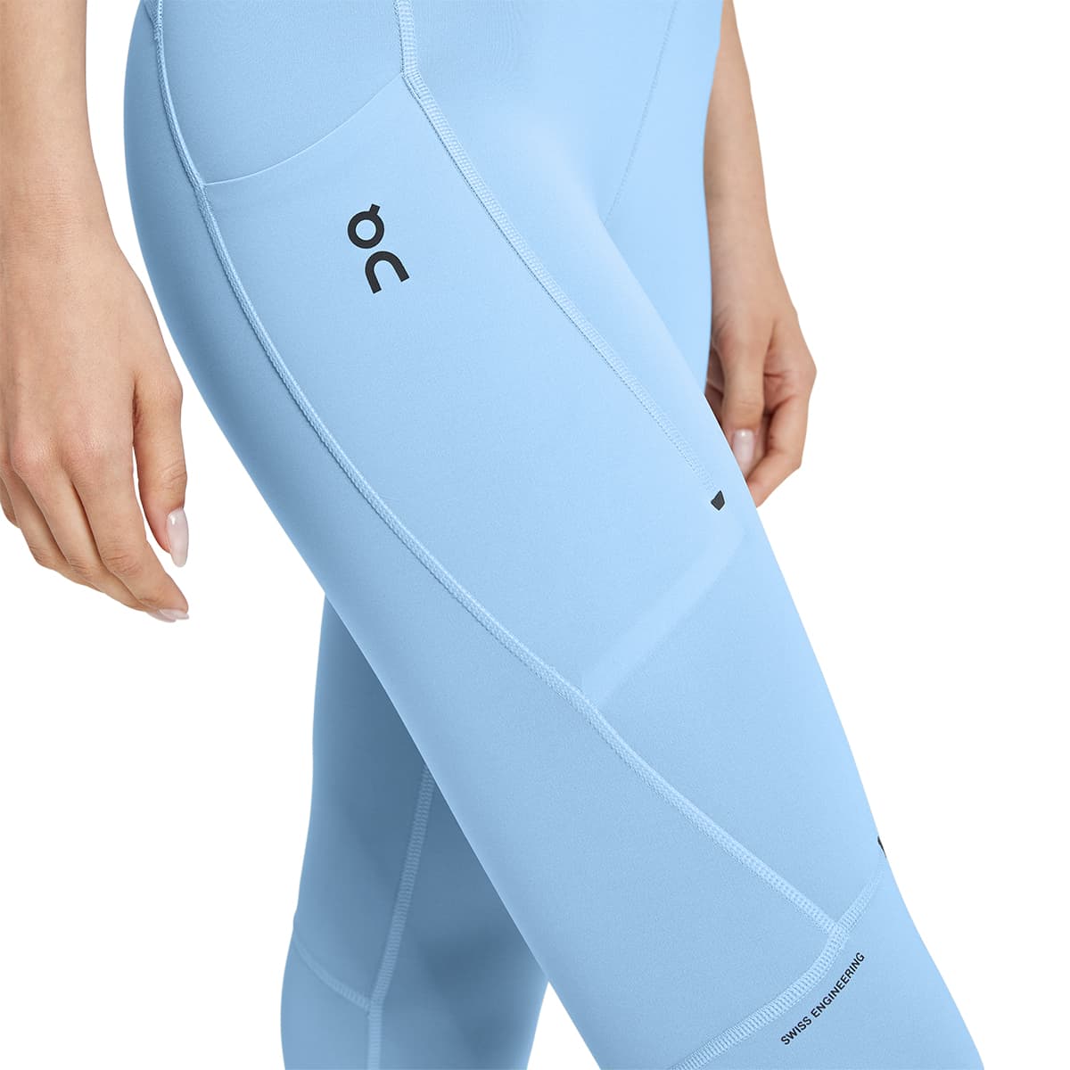 Woman wearing the On Performance Tights 7-8 Colour Stratosphere - Smart Phone Pocket