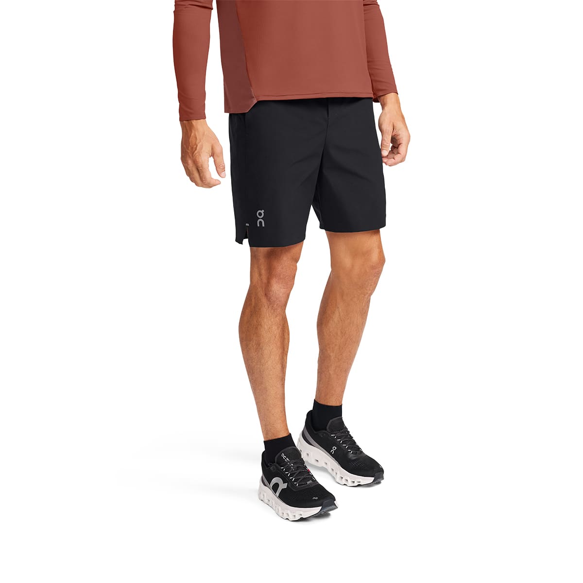 Man wearing the On Preformance Hybrid Shorts Colour Black