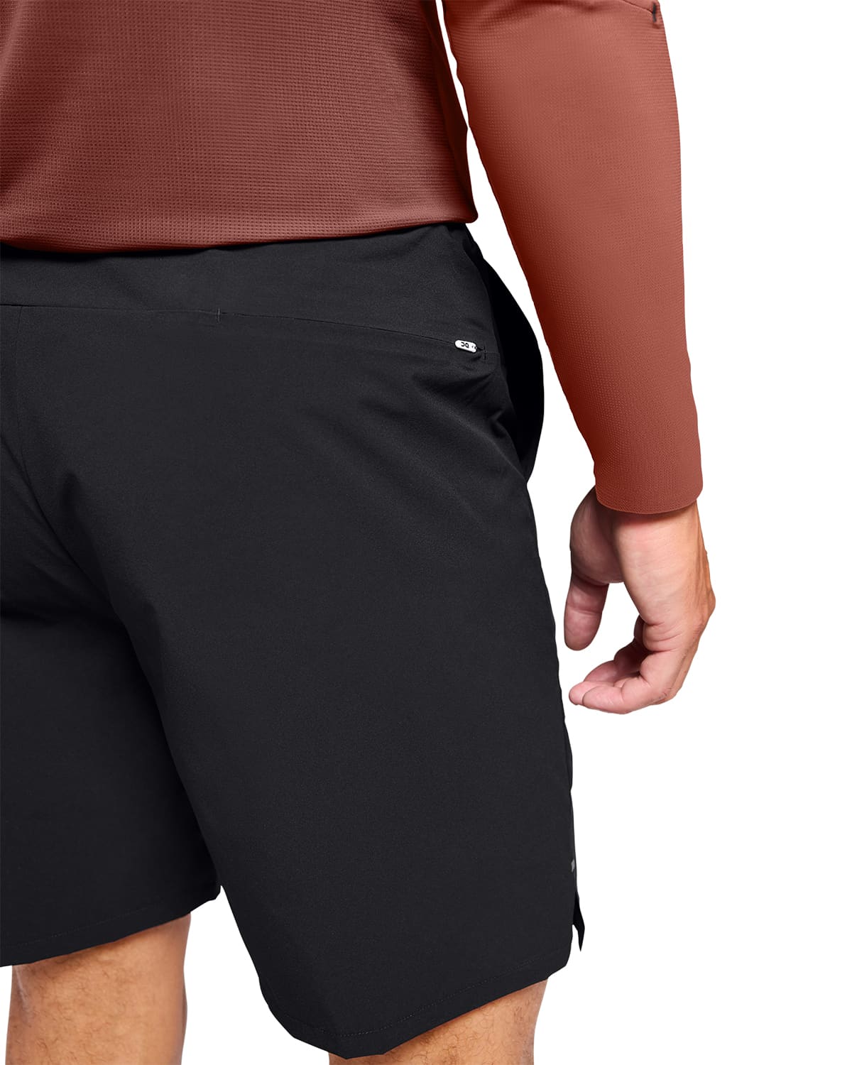 Man wearing the On Preformance Hybrid Shorts Colour Black - Detail. Back Zip Pocket
