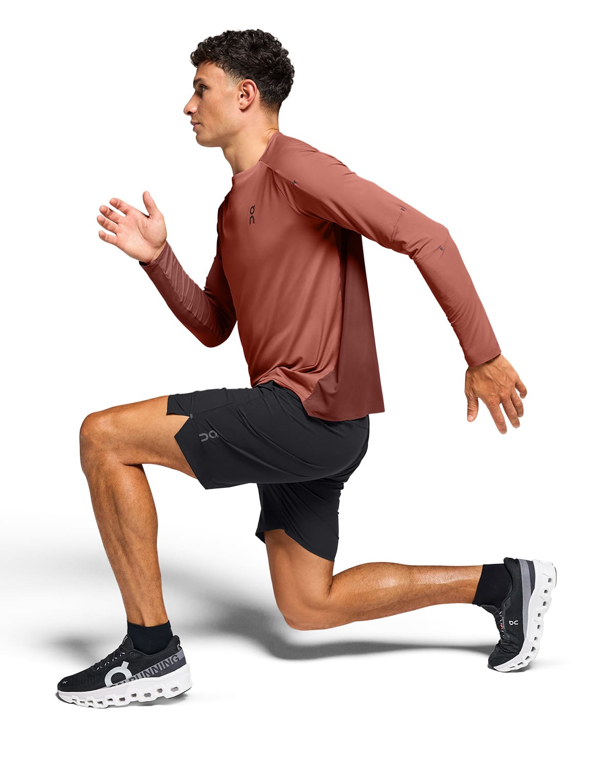 Man wearing the On Preformance Hybrid Shorts Colour Black - Stretch