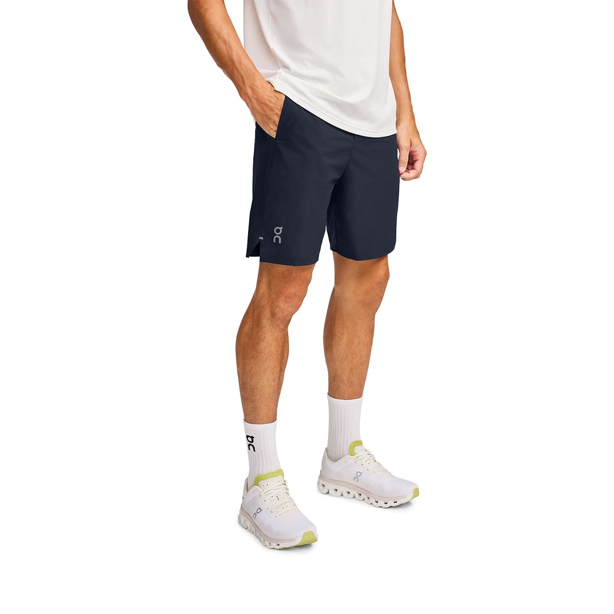 Man wearing the On Preformance Hybrid Shorts Colour Navy
