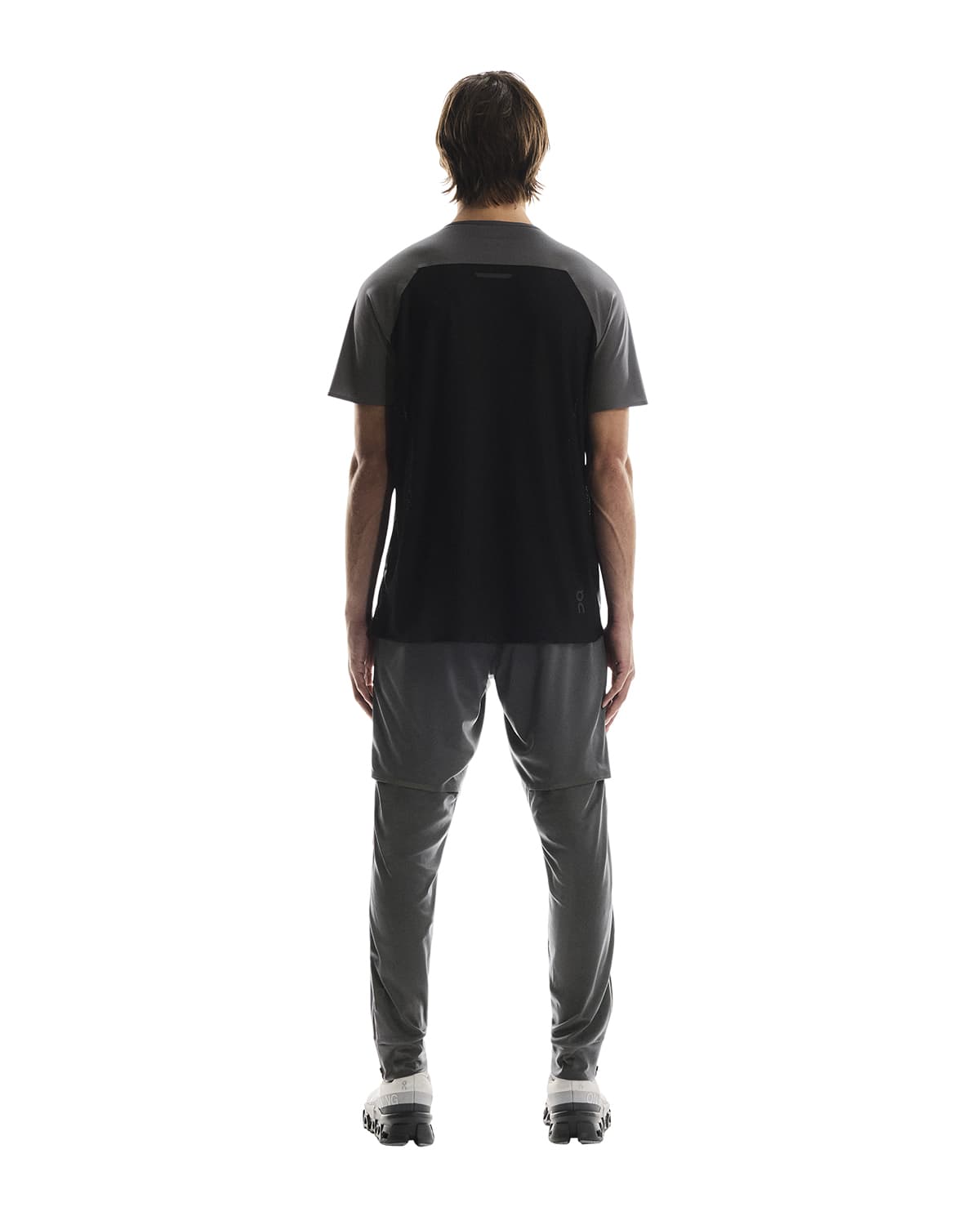 Man wearing the On Weather Pants Colour Silver Eclipse - Back View