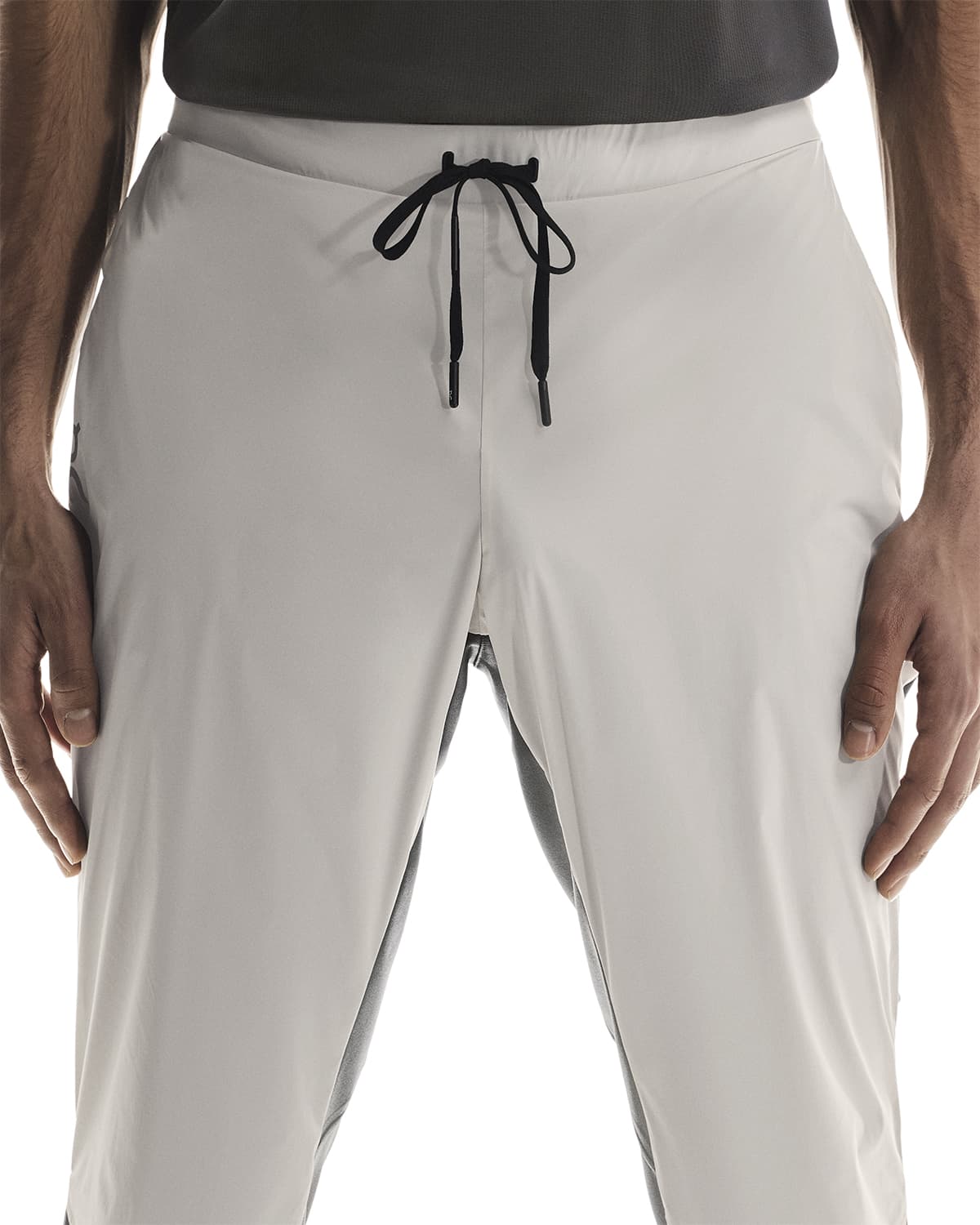 Man wearing the On Weather Pants Colour Silver Eclipse - Front Zoom Draw Strings