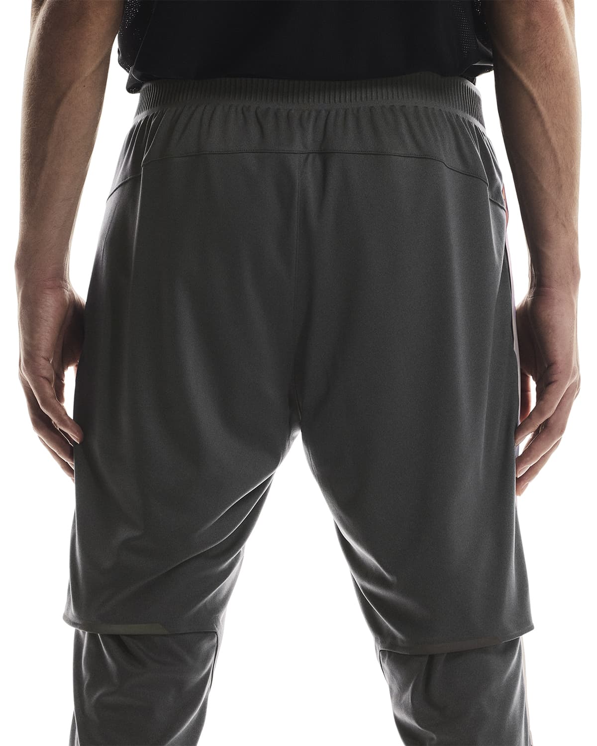 Man wearing the On Weather Pants Colour Silver Eclipse - Zoom Back View