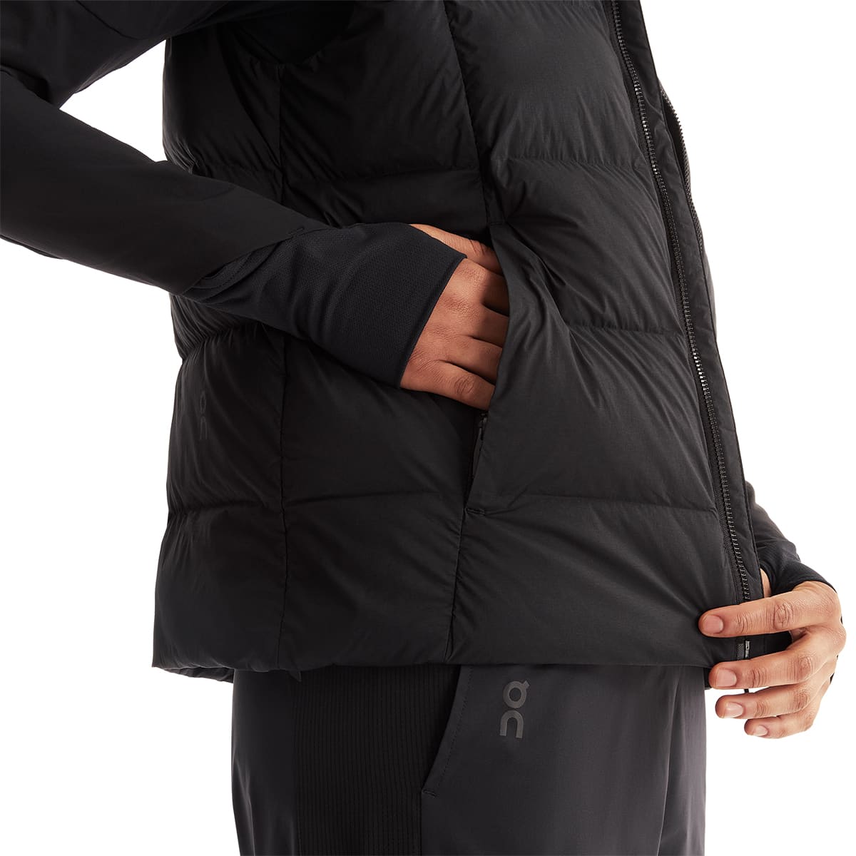Women wearing the On Challenger Vest Colour Black - Front View Pocket