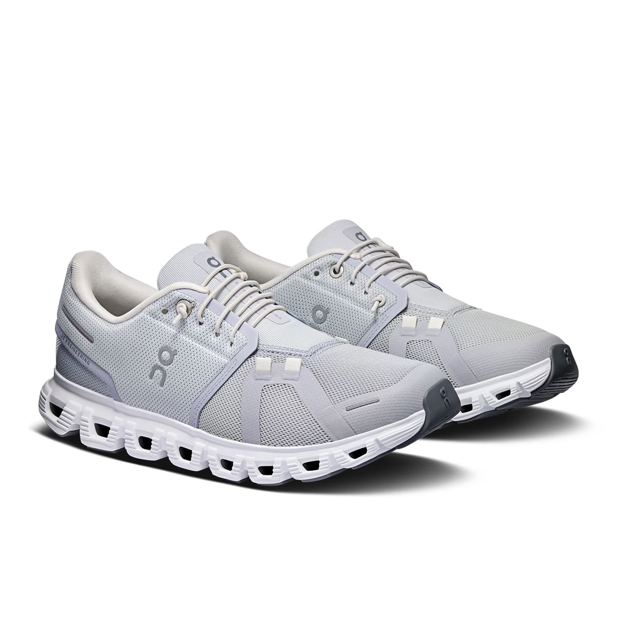 Soles of the On Cloud 6 Glacier-White men’s running shoes