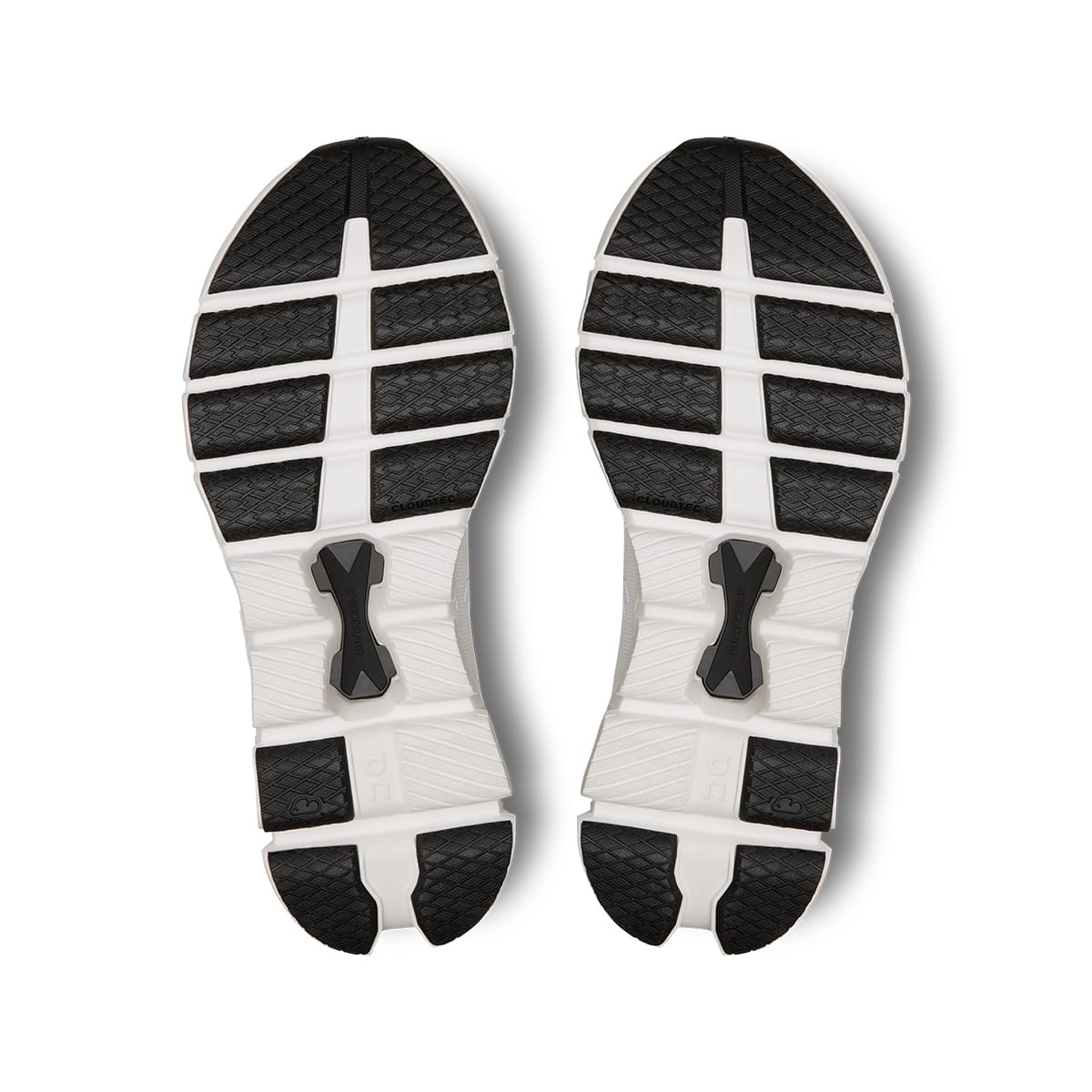 Soles of the On Cloud X4 Ivory-Black women’s running shoes