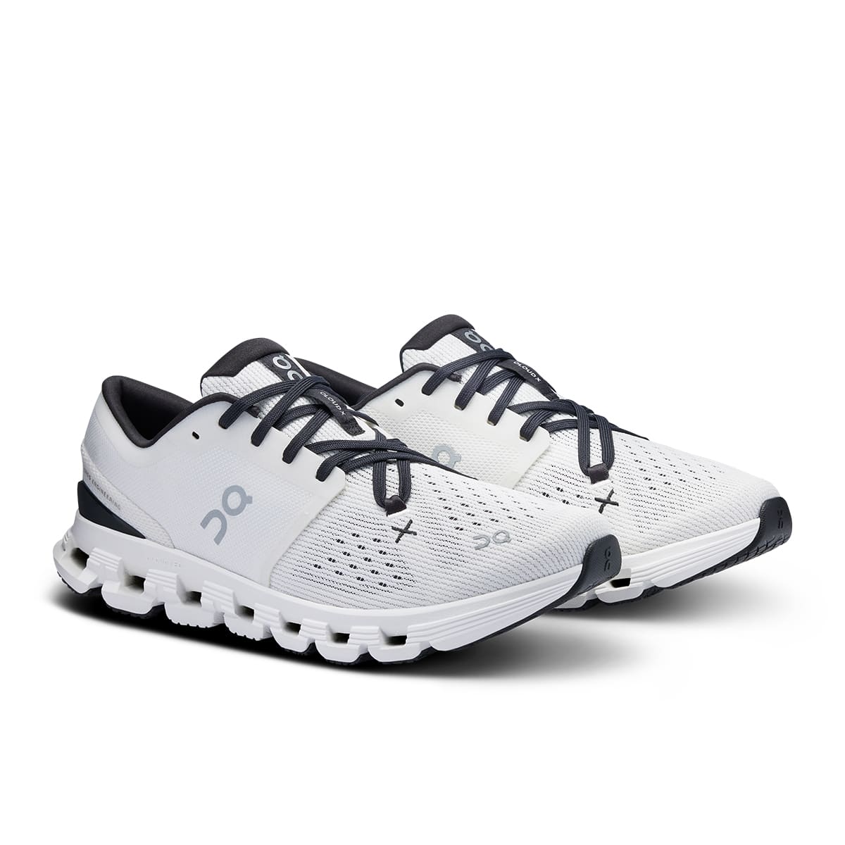 45-degree view of the On Cloud X4 Ivory-Black women’s running shoe