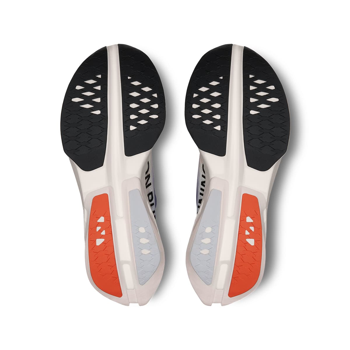 Soles of the On Cloudboom Strike White-Flame men’s running shoes