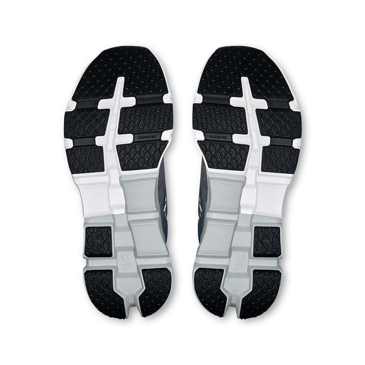 Soles of the On Cloudflyer 5 Stone-Glacier men’s running shoes