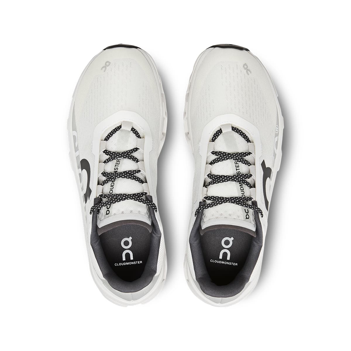 Top view of the On Cloudmonster All White women’s running shoes