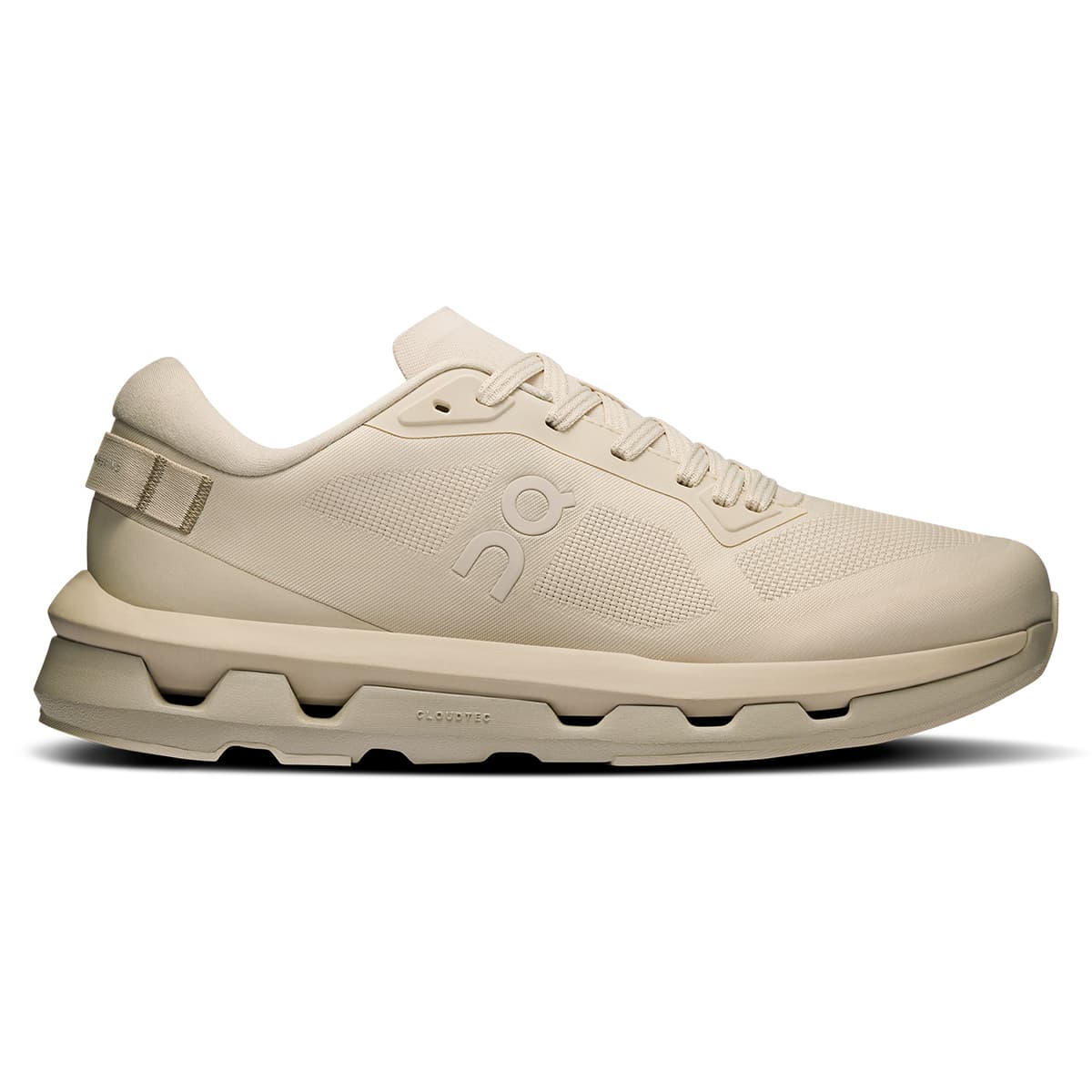 Right side view of the On Cloudzone Pearl-Truffle women’s running shoe