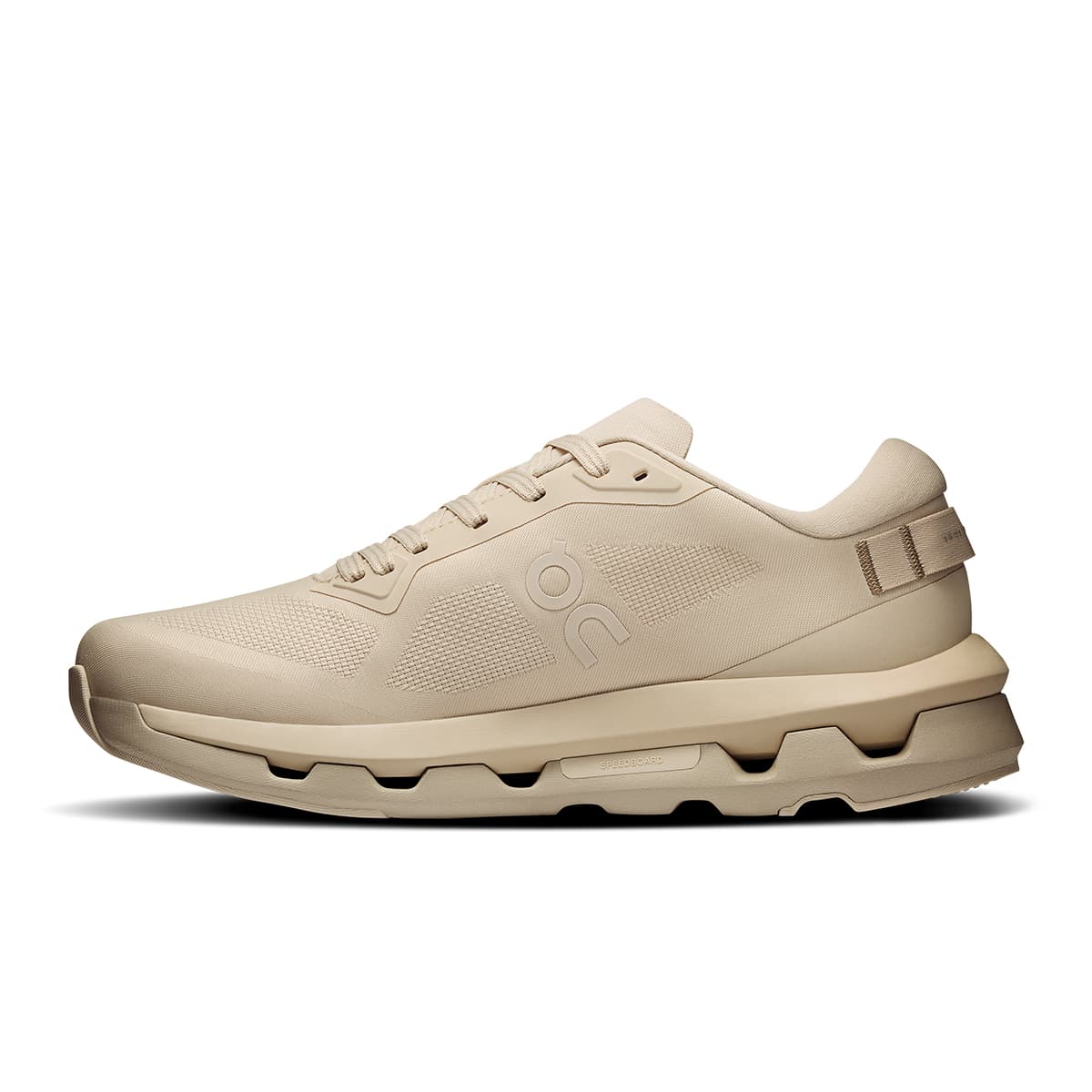 Left side view of the On Cloudzone Pearl-Truffle women’s running shoe