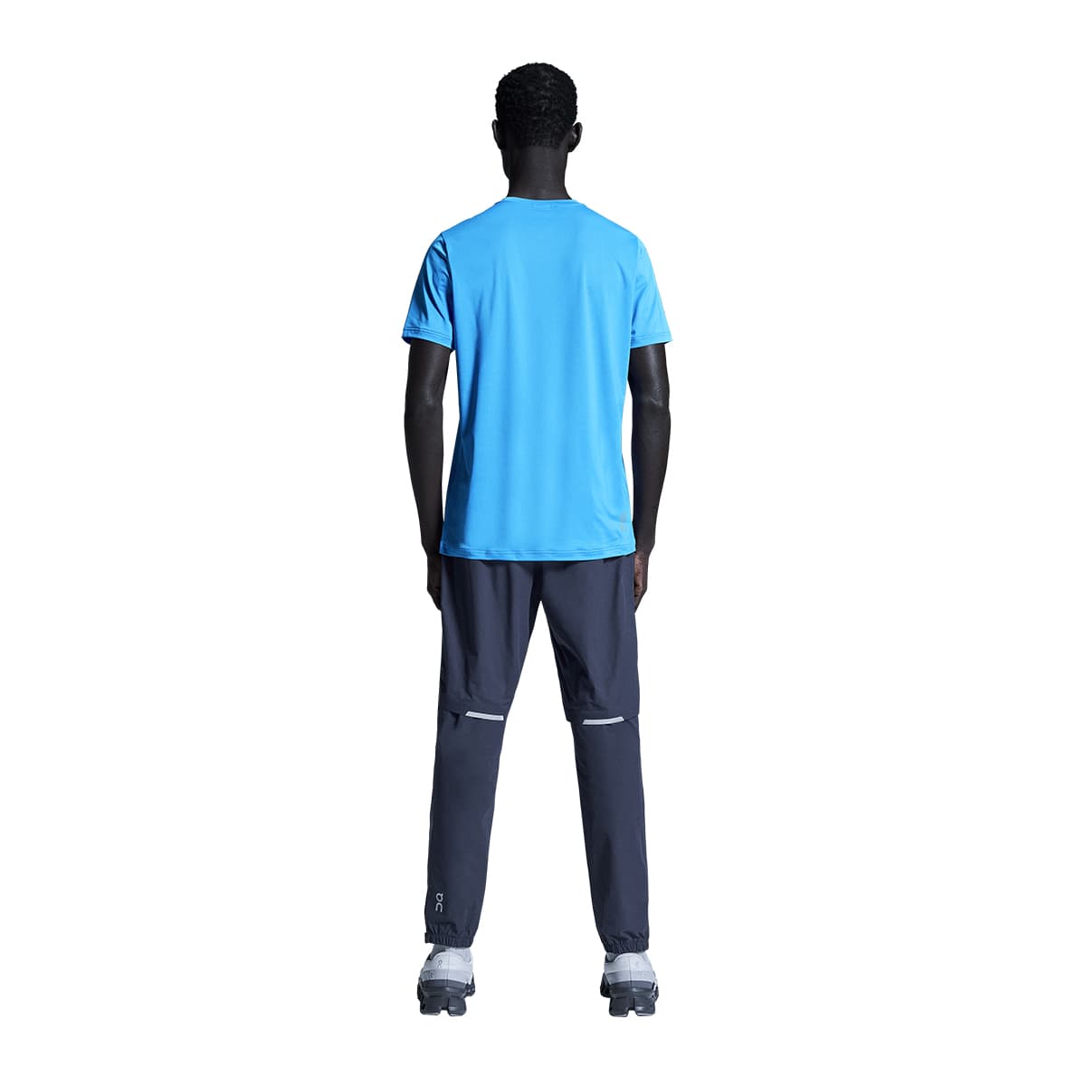 Man wearing the On Core T Colour Malibu - Back Angle