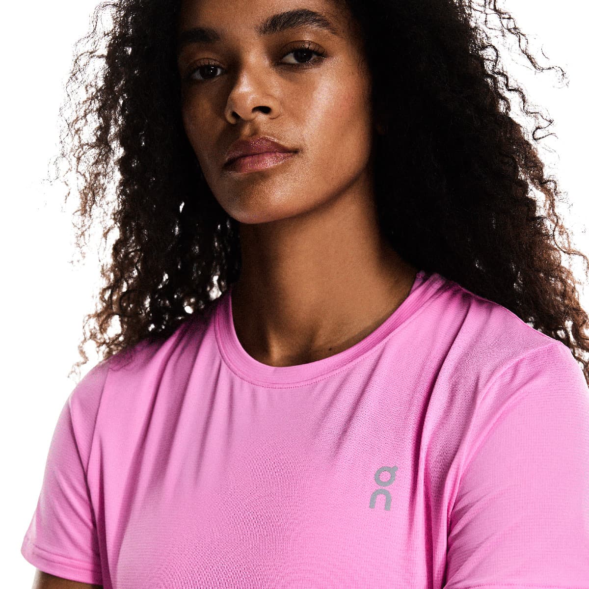 Women wearing the On Core T Colour Raspberry - Front View Close up