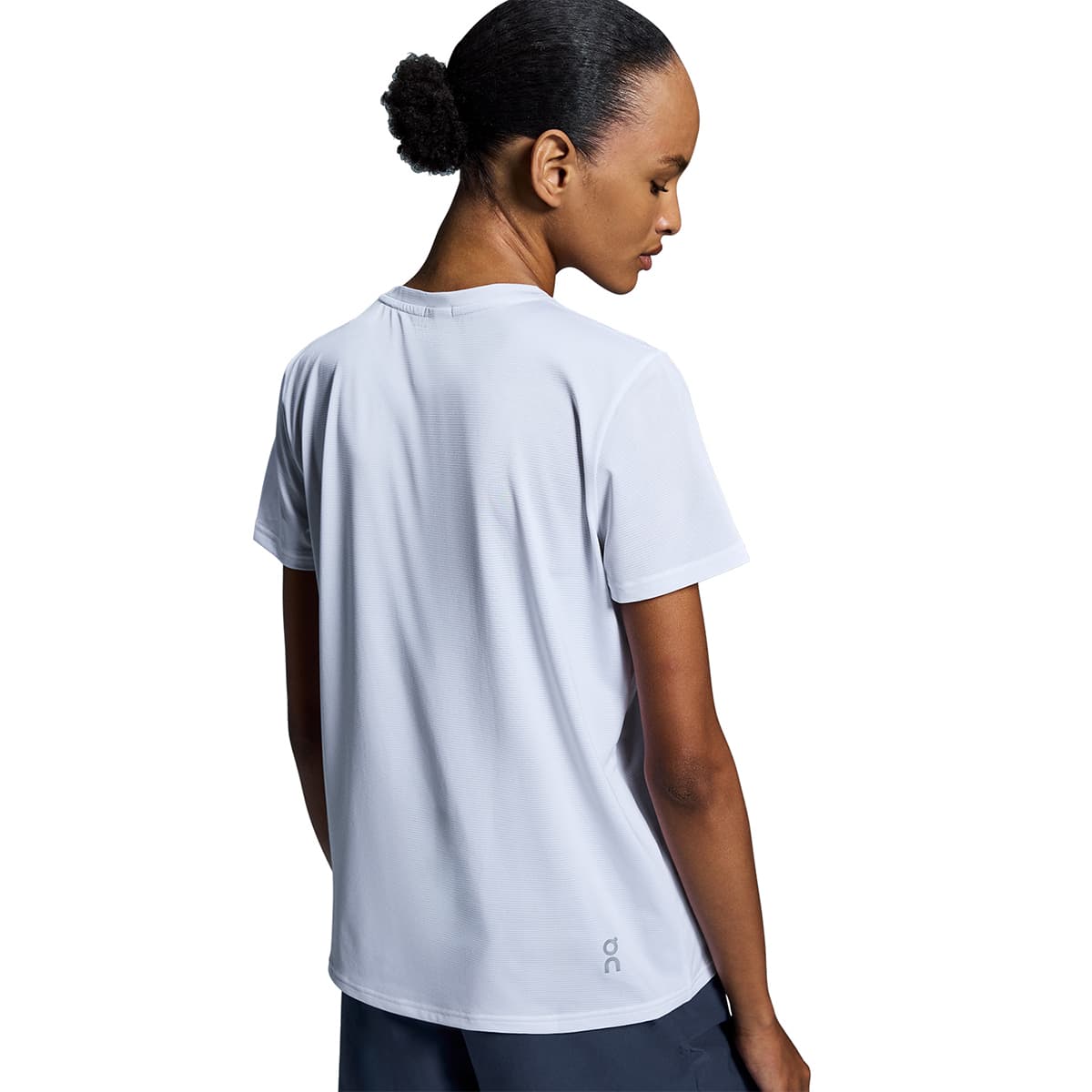 Women wearing the On Core T Colour White - Back View Detail