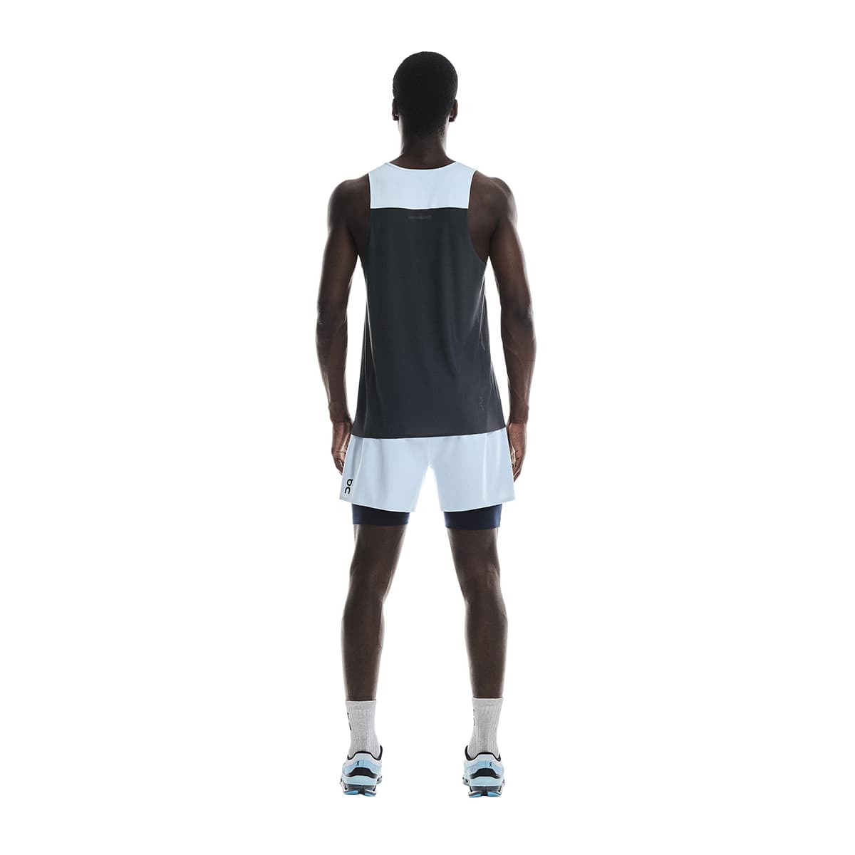 Man wearing the On Performance Tank Colour Arctic-Eclipse - Rear View