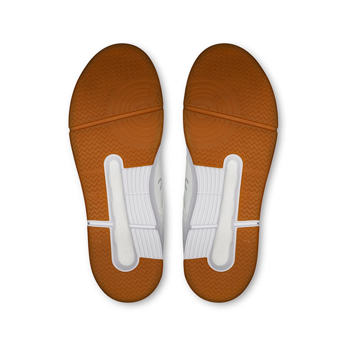 Soles of the On The Roger Clubhouse White-Ivory men’s running shoes