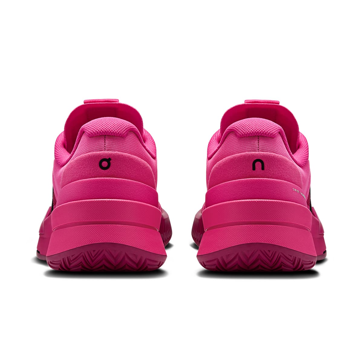 Rear heel view of the On The Roger Pro 2 Pink Grenadine women’s tennis shoe