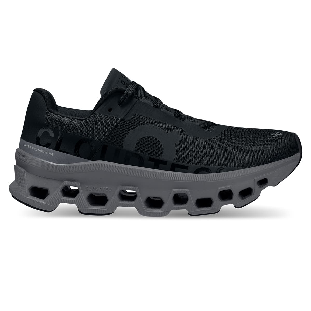 Right side view of the On Cloudmonster Black Magnet women's running shoe