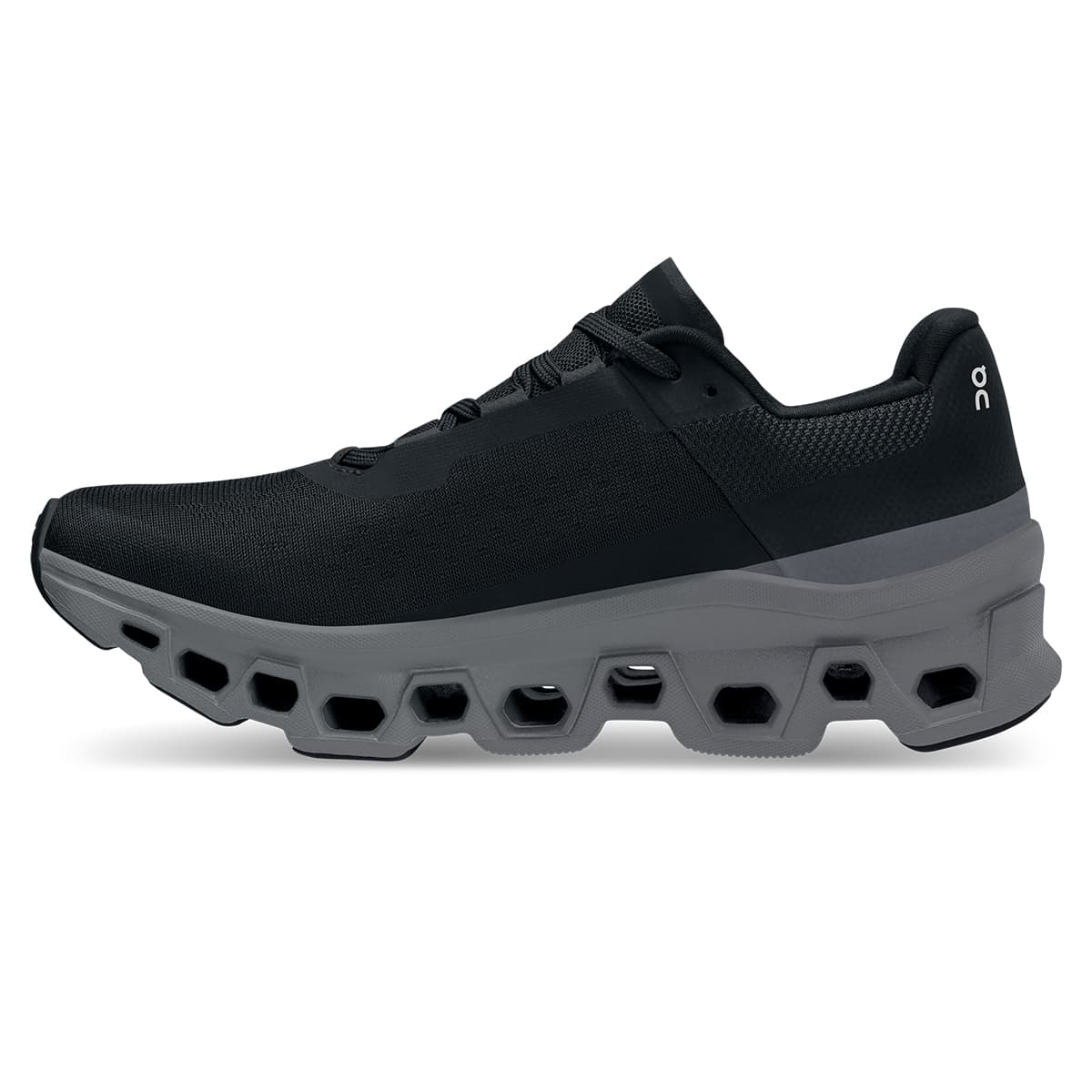 Left side view of the On Cloudmonster Black Magnet women's running shoe
