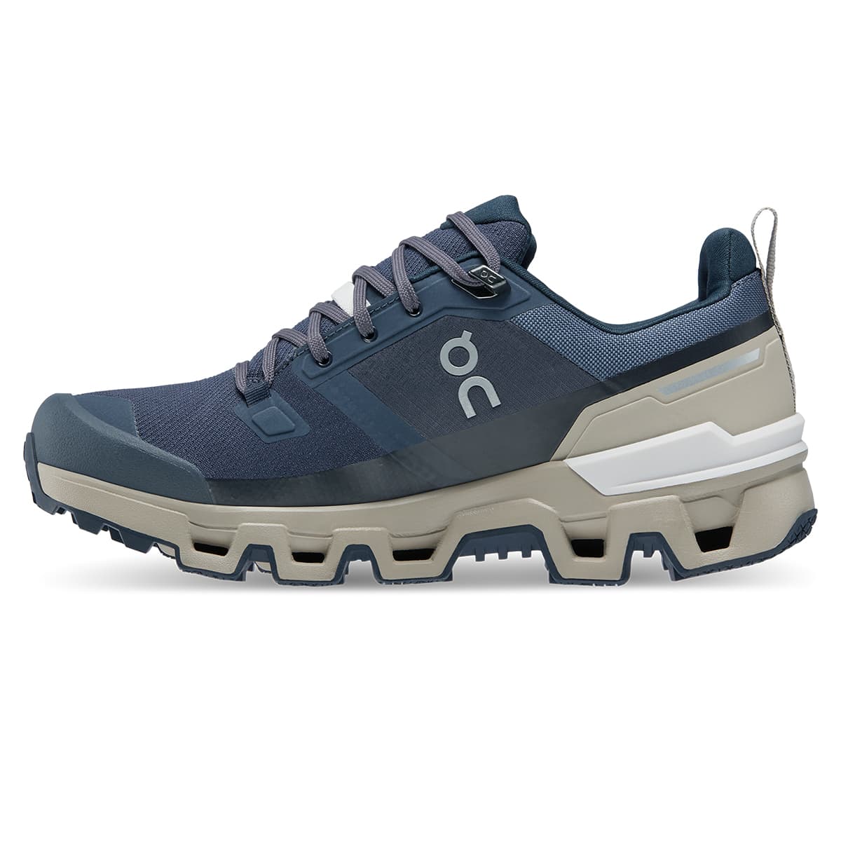 Left side view of the On Cloudwander Waterproof Navy-Desert women’s running shoe