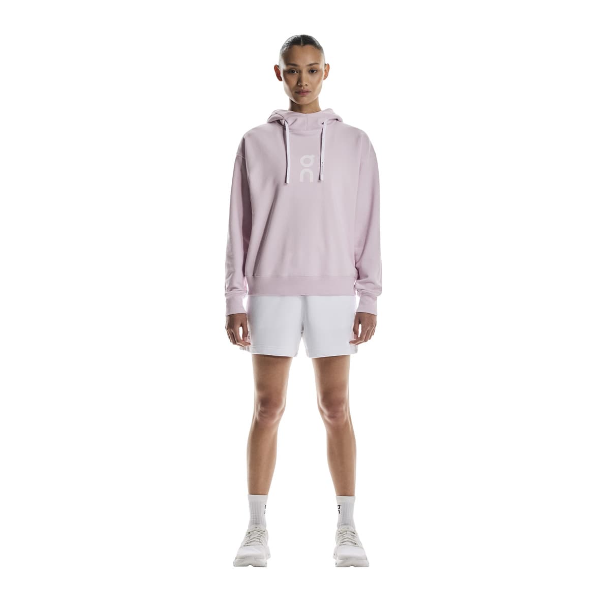 Full front view of female model wearing the On Club Hoodie in Orchid