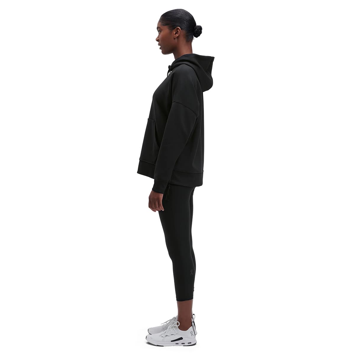 Women wearing the On Hoodie Colour Black - Side Detail