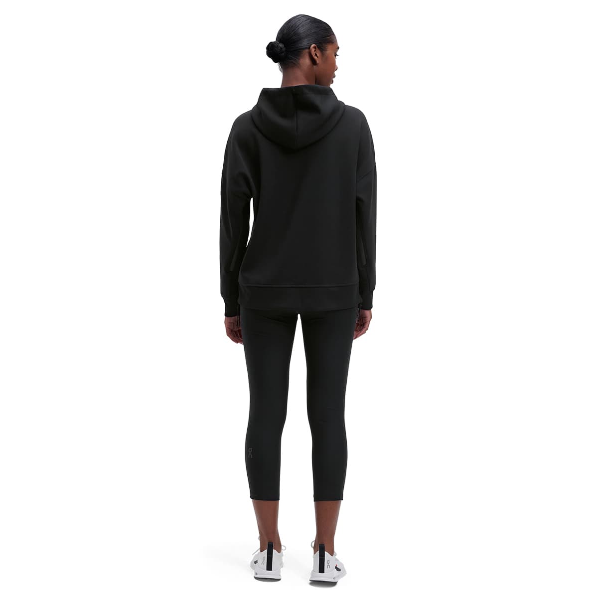 Women wearing the On Hoodie Colour Black - Back View