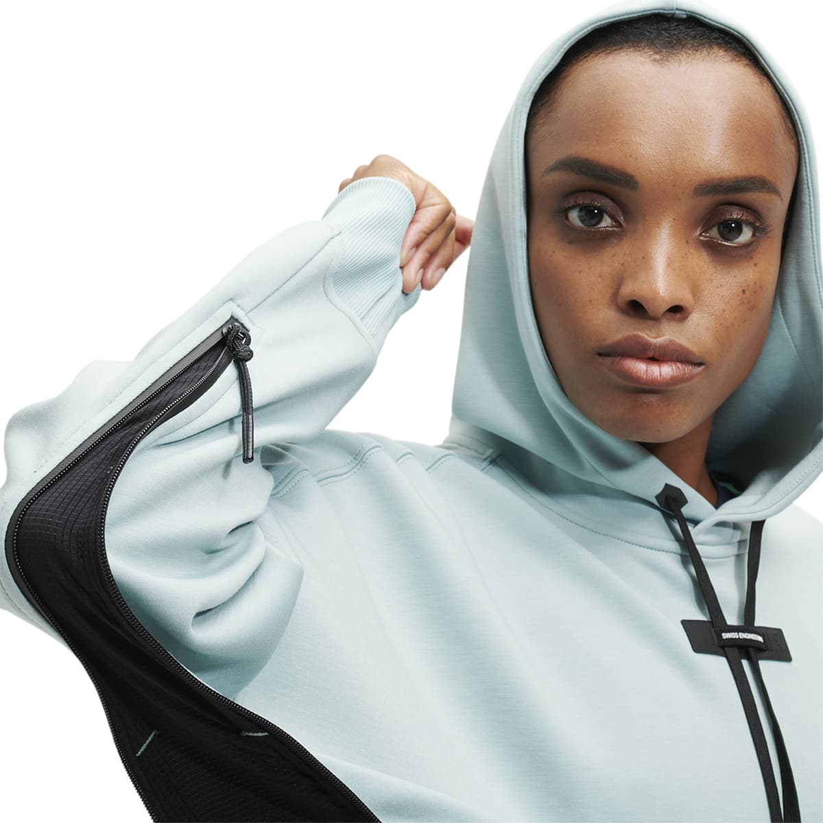 Product shot of the Women’s On Hoodie Colour Sea - Detail Arm Zip