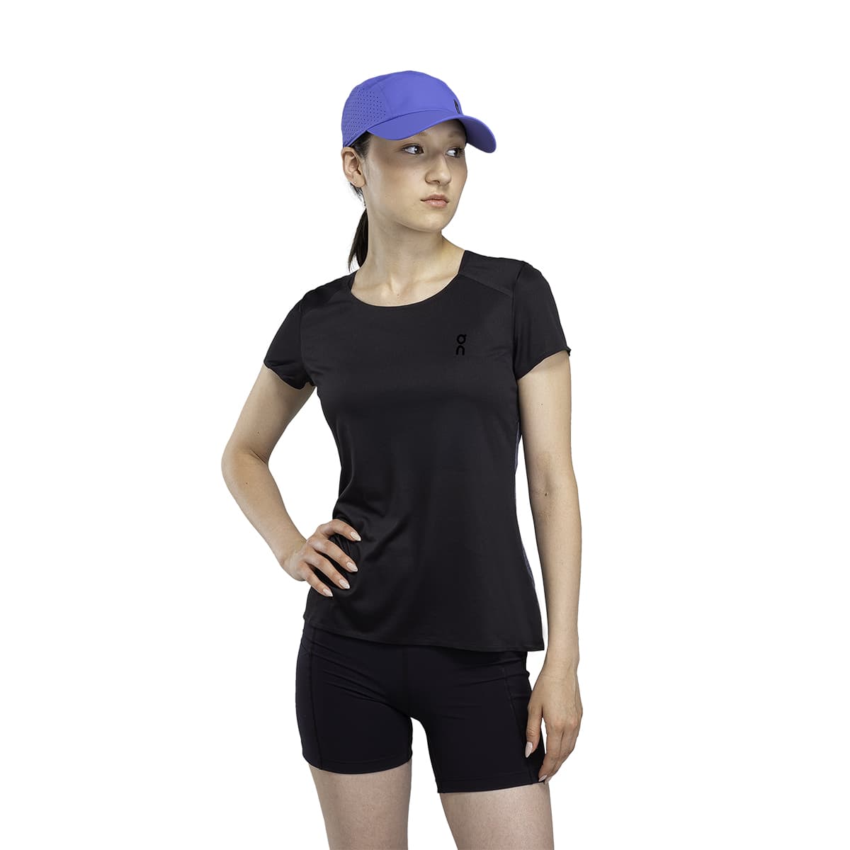 Female Model wearing the On Lightweight Cap Colour Cobalt
