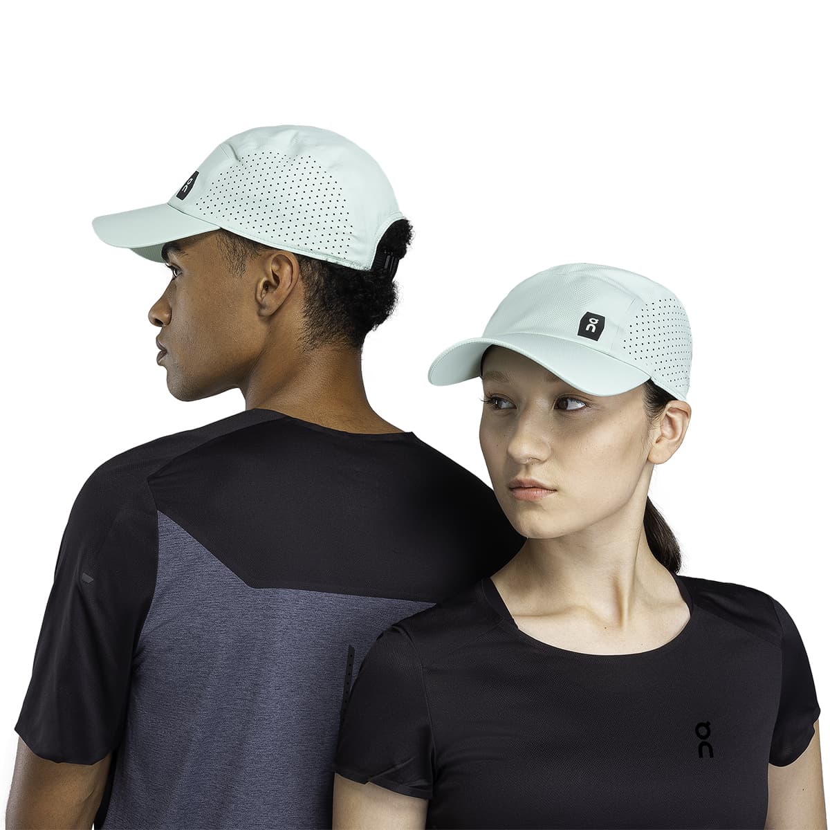 Models wearing the On Lightweight Cap Colour Creek