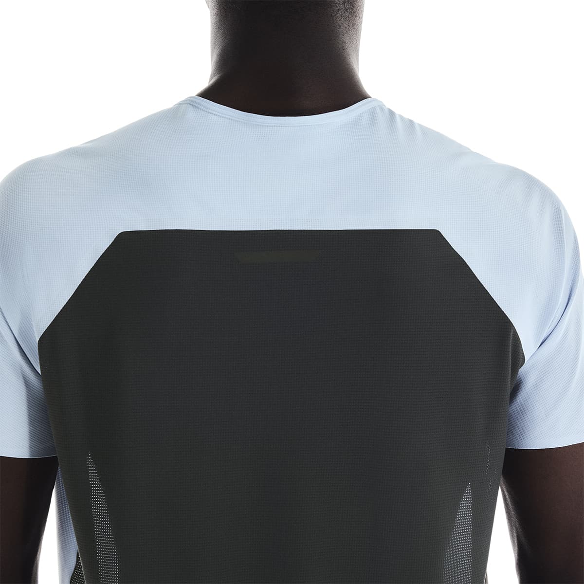 Man wearing the On Performance T Colour Arctic-Eclipse - Back View Detail