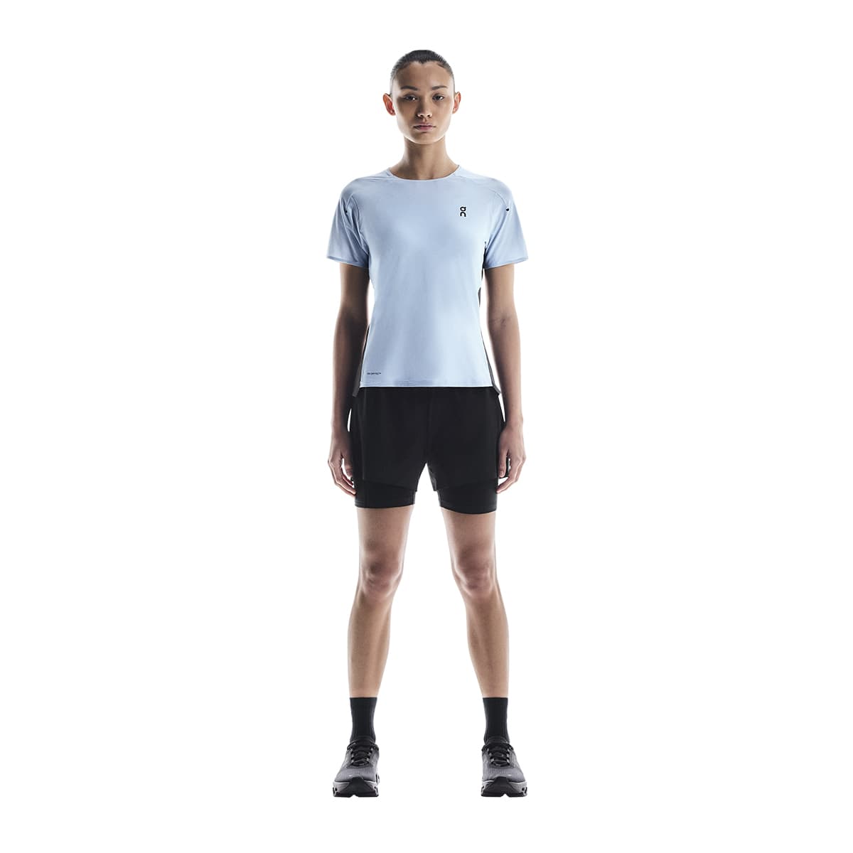 Woman wearing the On Performance T Colour Arctic-Eclipse