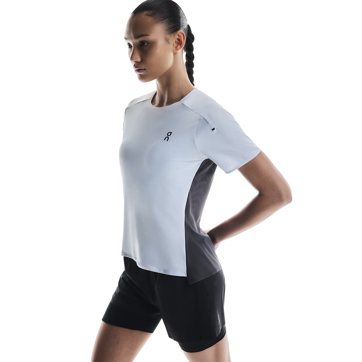 Woman wearing the On Performance T Colour Arctic-Eclipse - Side Angle