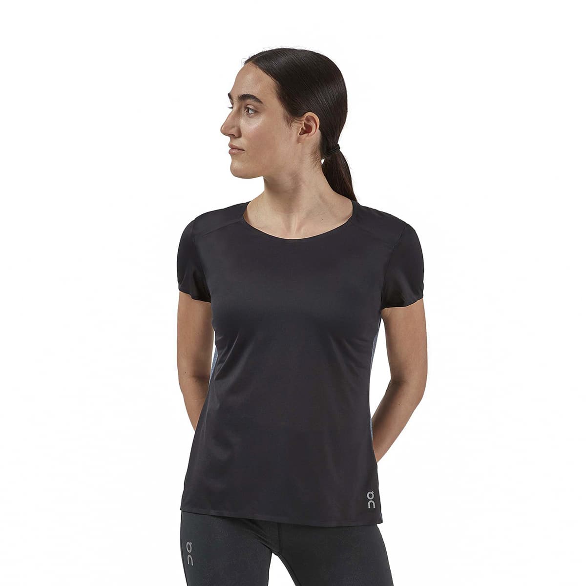 Woman wearing the On Performance T Colour Black Dark