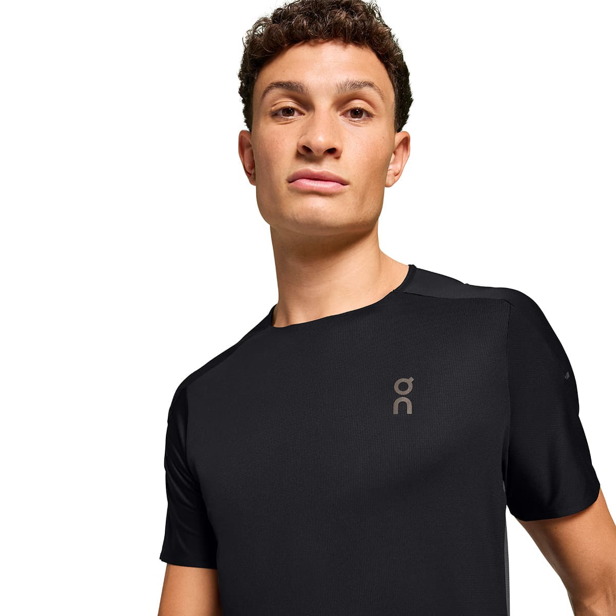 Man wearing the On Performance T Colour Black-Eclipse - Close up Front Detail #color_black-eclipse