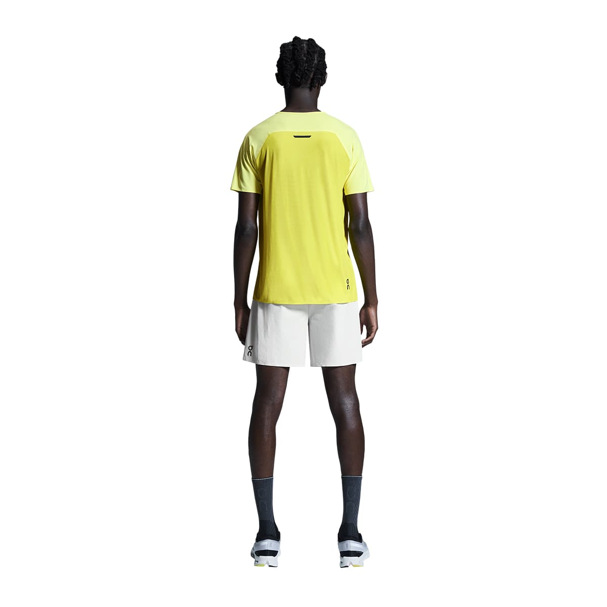 Man wearing the On Performance T Colour Limelight-Lime - Back View