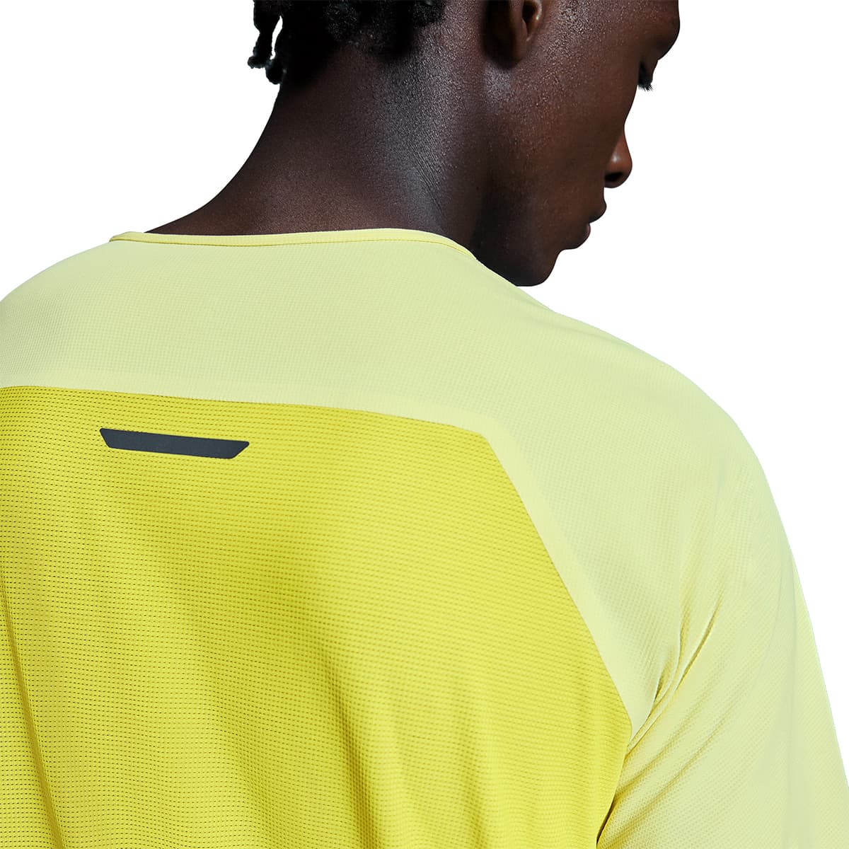 Man wearing the On Performance T Colour Limelight-Lime - Back View xlose up zoom