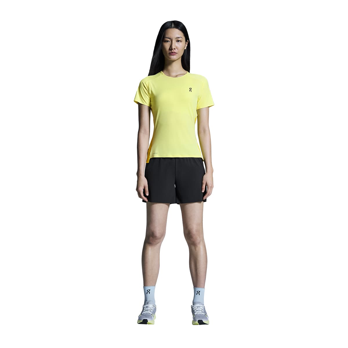 Woman wearing the On Performance T Colour Limelight-Lime - Front View Standing