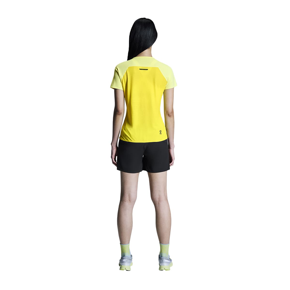 Woman wearing the On Performance T Colour Limelight-Lime - Back View