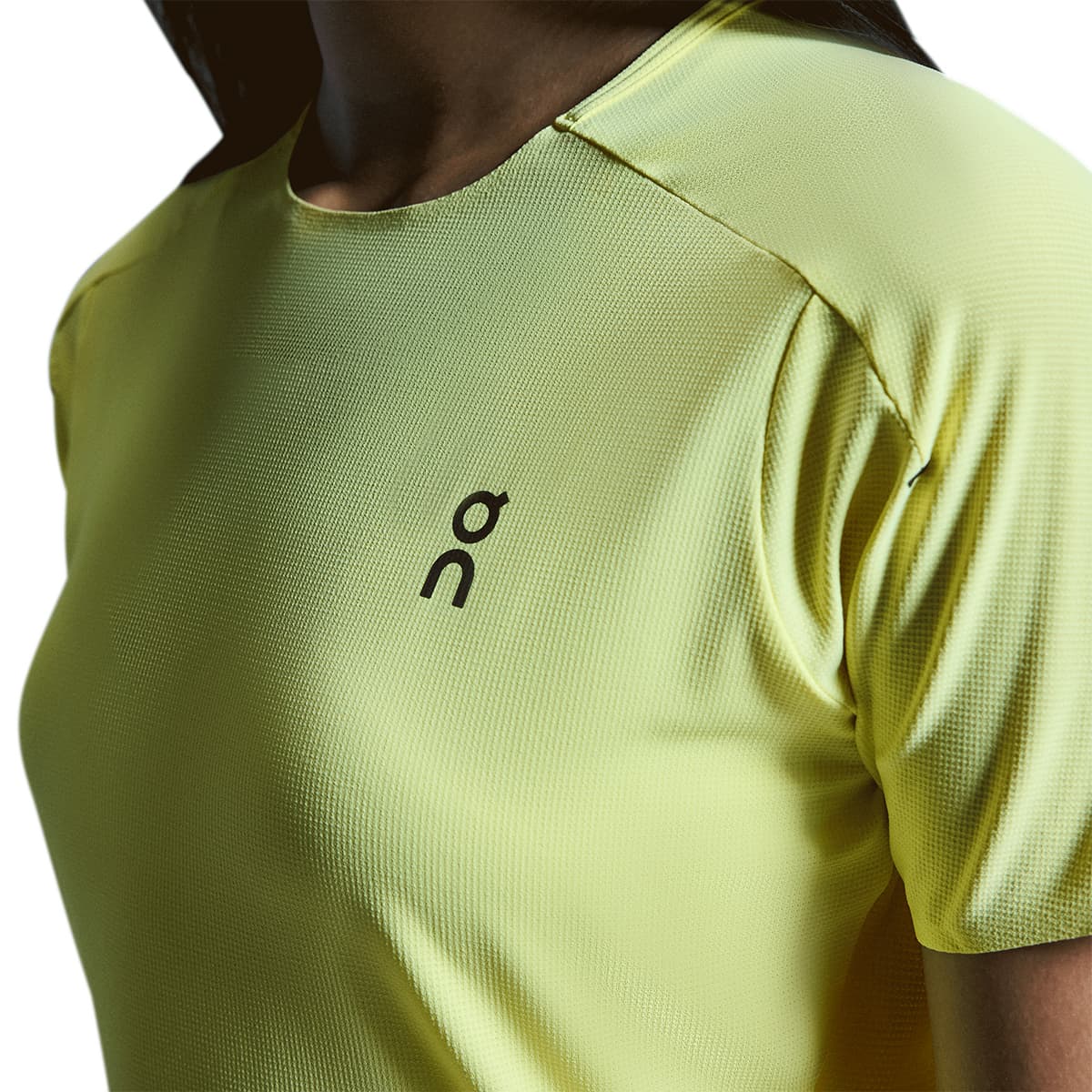 Woman wearing the On Performance T Colour Limelight-Lime - Zoom View Front