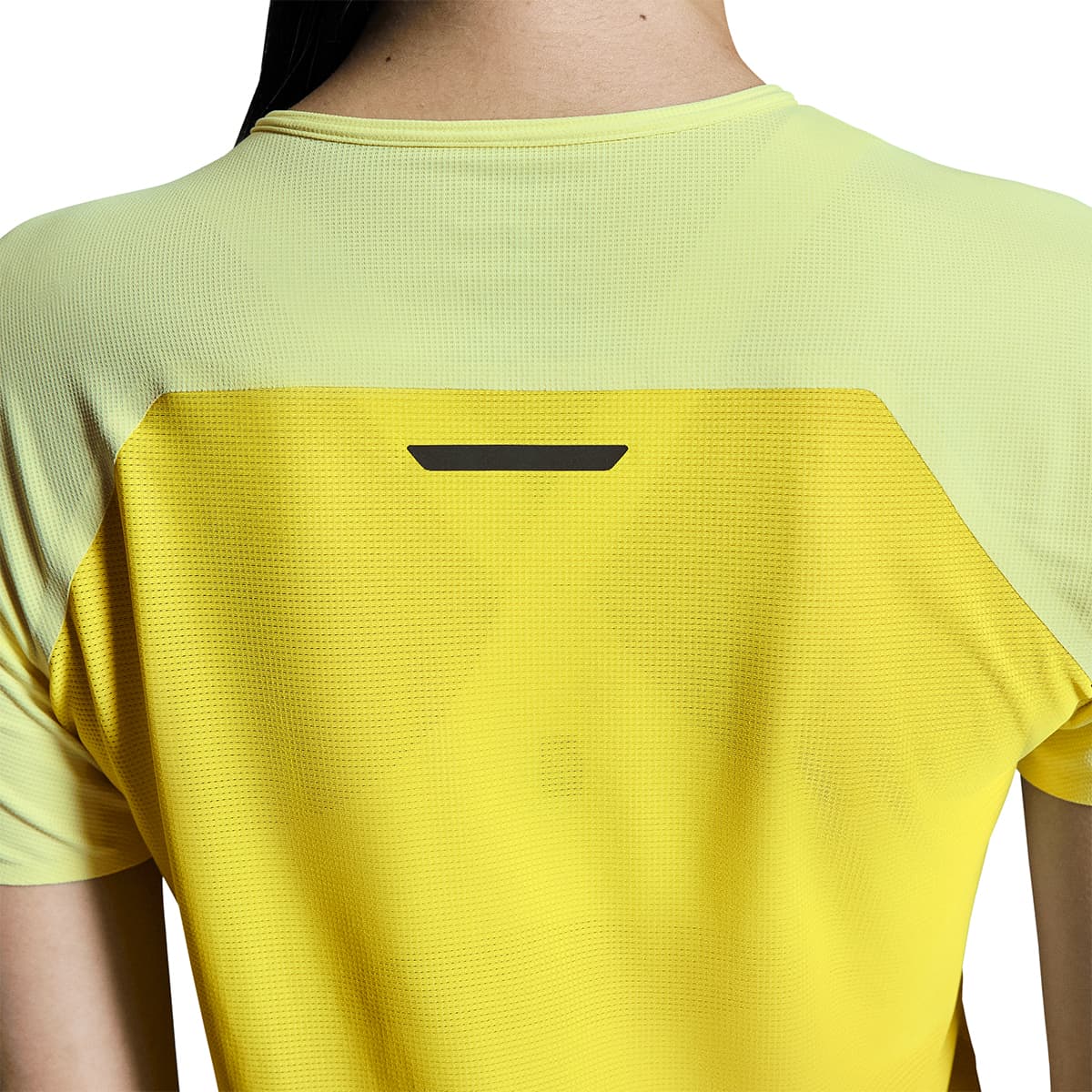 Woman wearing the On Performance T Colour Limelight-Lime - Zoom View Back