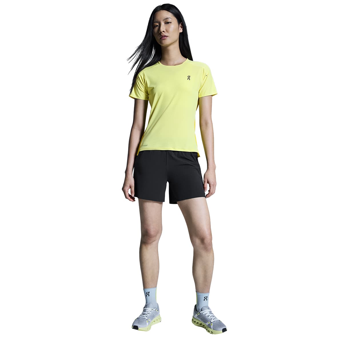 Woman wearing the On Performance T Colour Limelight-Lime