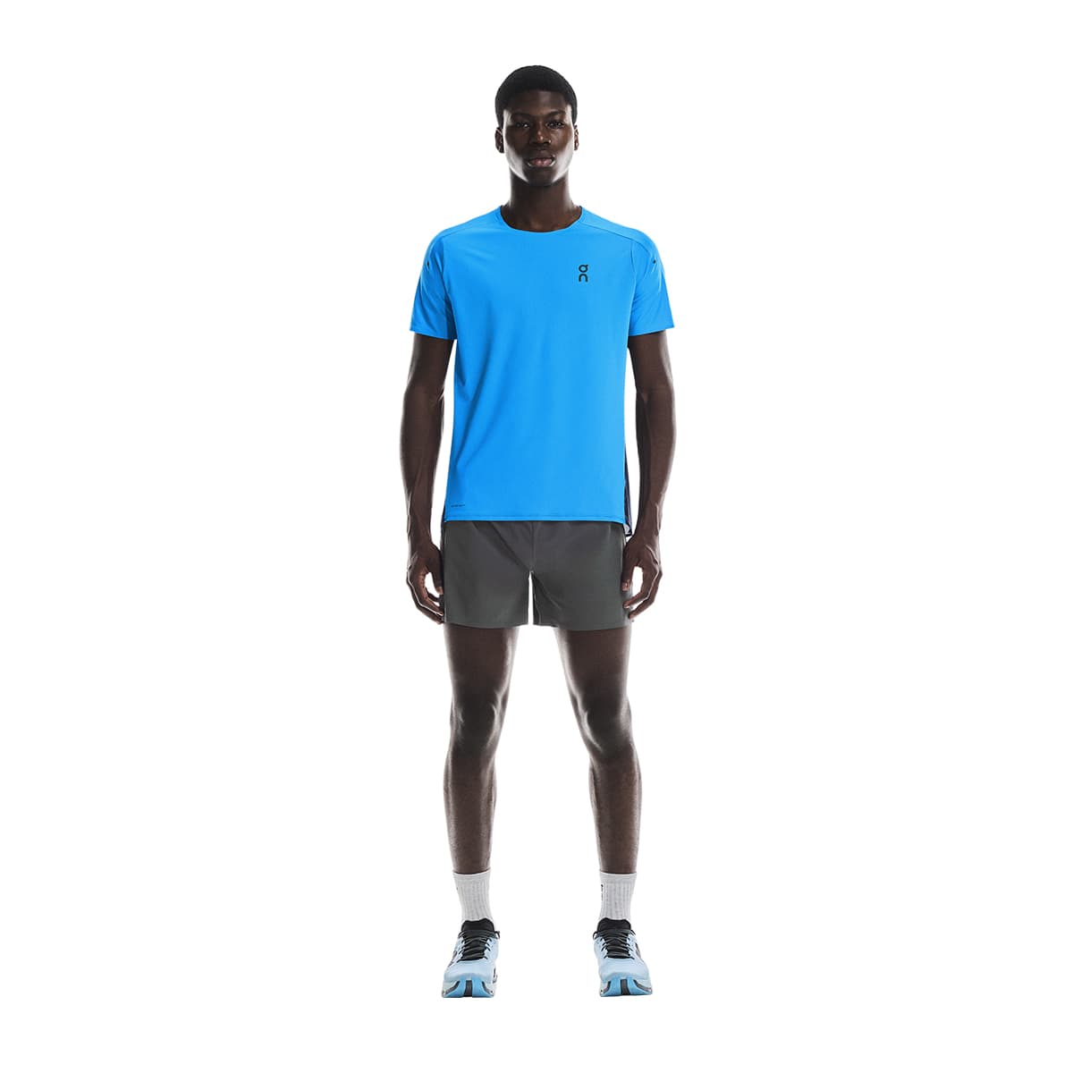 Man wearing the On Performance T Colour Malibu-Navy - Front View