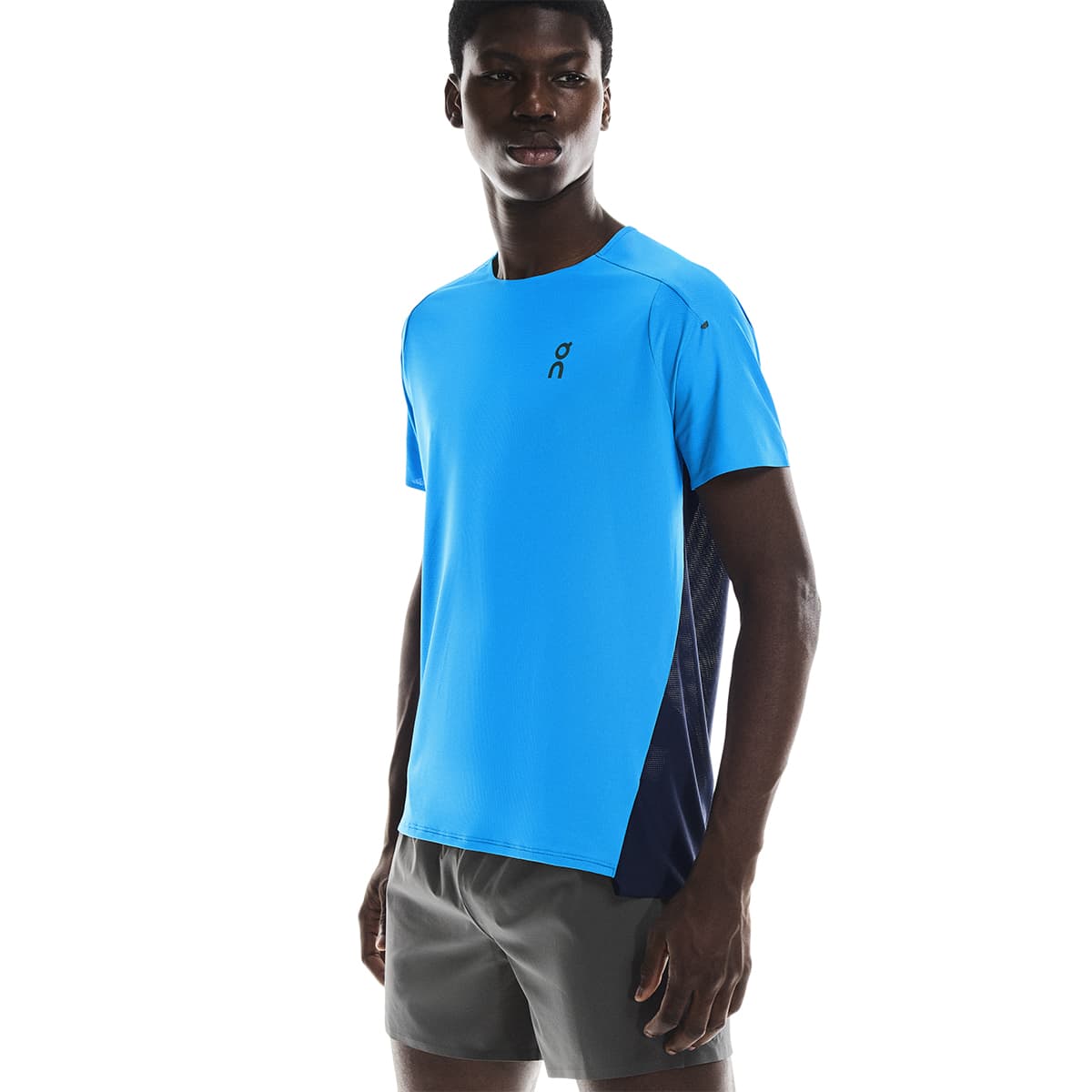 Man wearing the On Performance T Colour Malibu-Navy - Side View