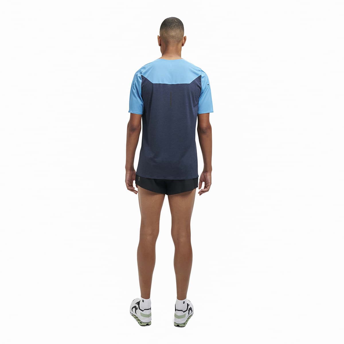 Man wearing the On Performance T Colour Niagra-Navy - Back View