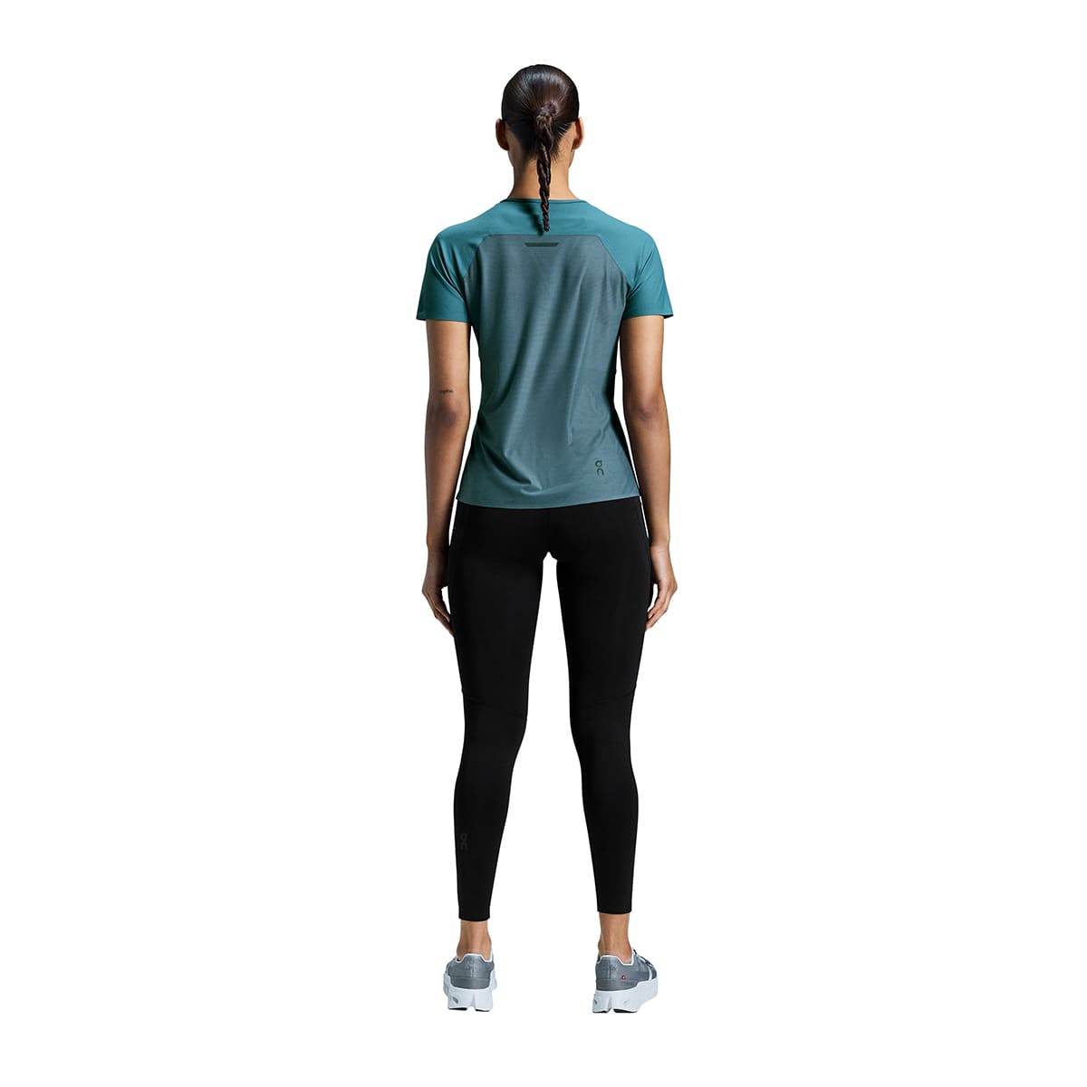 Woman wearing the On Performance T Colour Storm Stone - Back View