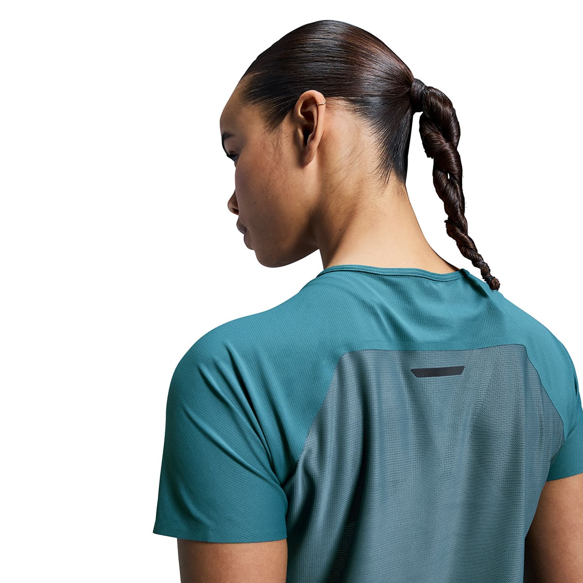 Woman wearing the On Performance T Colour Storm Stone - Back View Detail